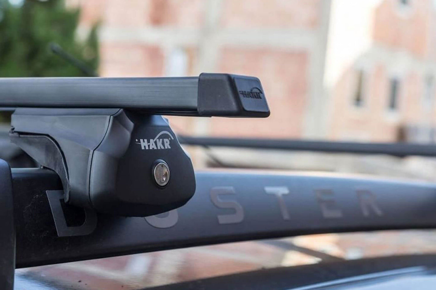 Cleme Hakr tip 184 pentru barele Dacia Duster (2014–2017), negre, 4 bucăți