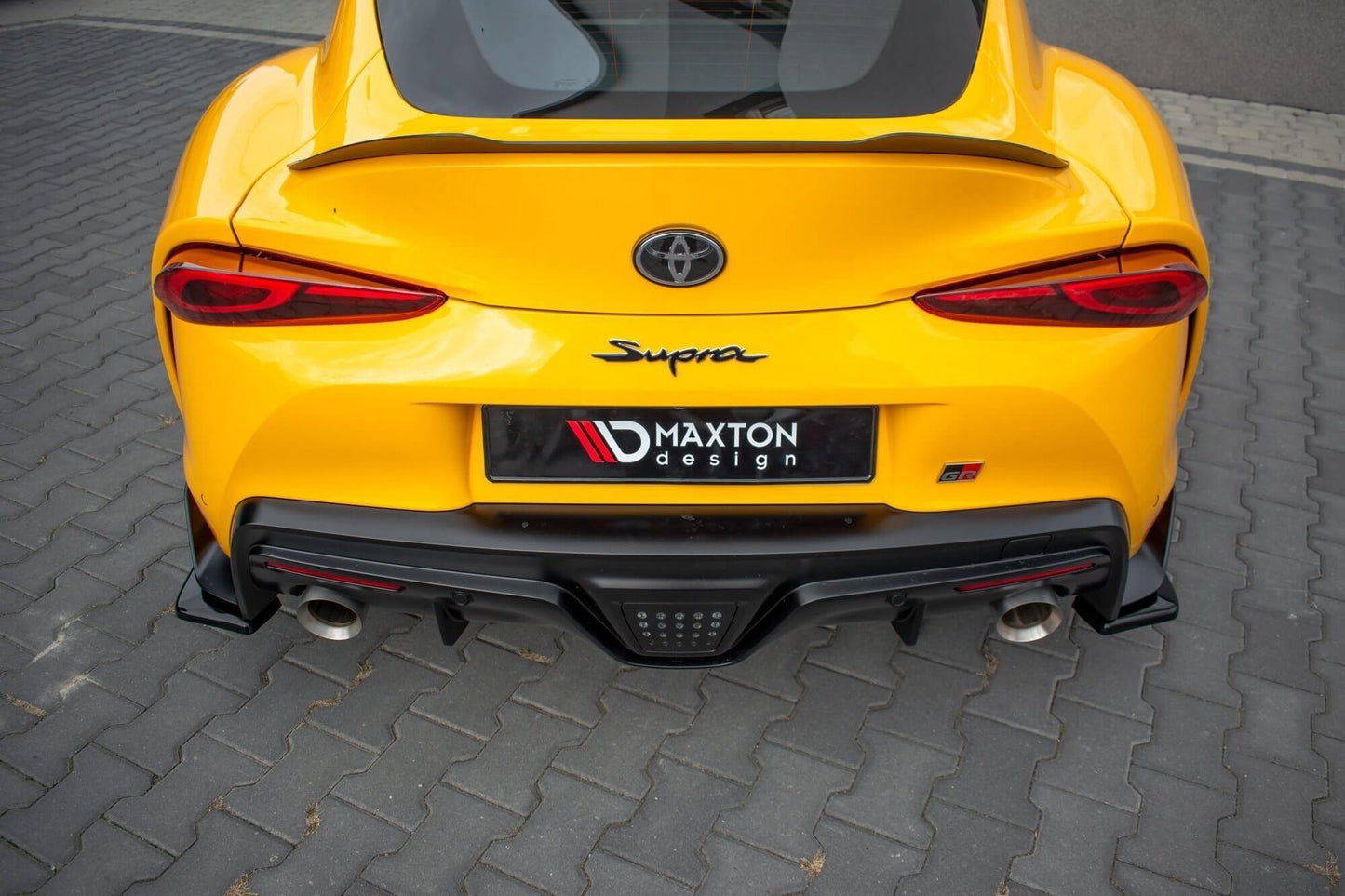 Maxton Design side skirts version 1 for Toyota Supra (2019+) rear bumper, carbon color