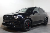 Pachet tuning tip 63 compatibil cu Mercedes GLE SUV W167 dupa 2020, cu elemente negre.