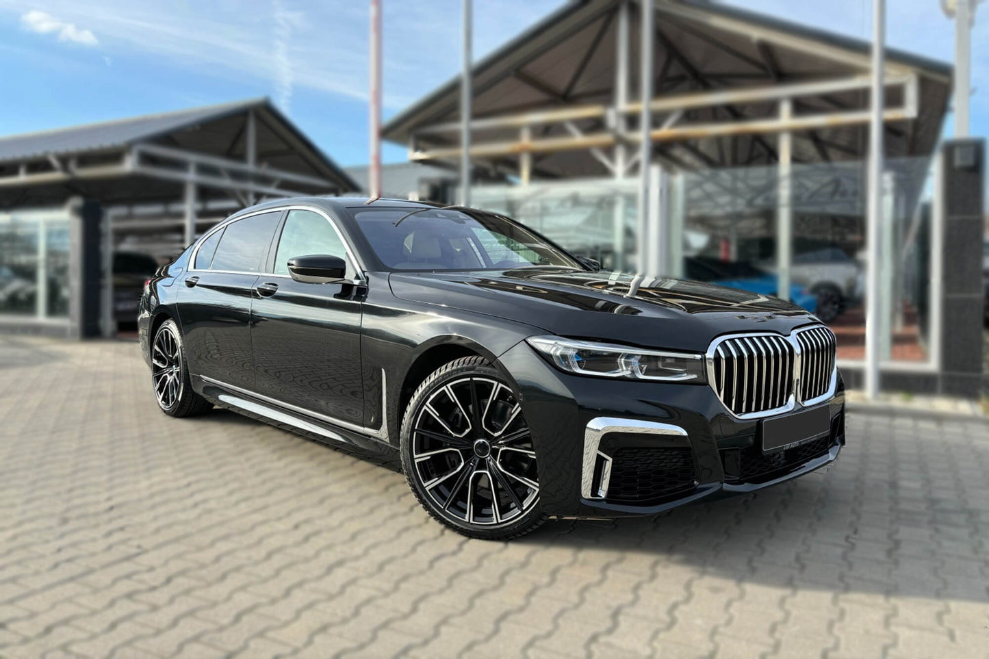 LCI tuning package compatible with BMW 7 Series G12 long wheelbase (2016-2018), with glossy black elements