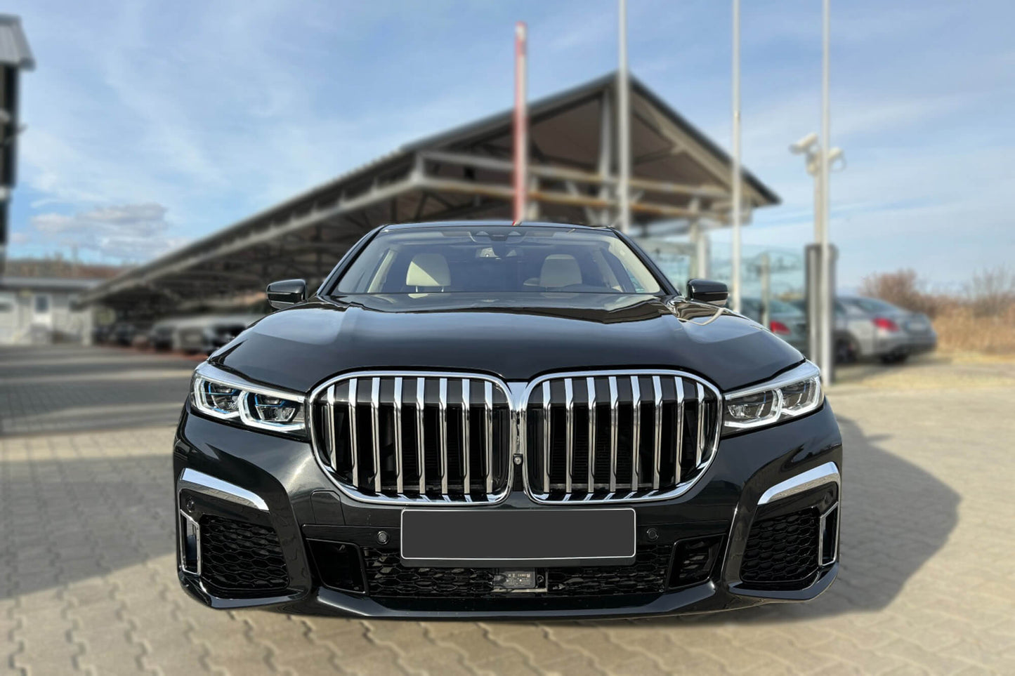 LCI tuning package compatible with BMW 7 Series G12 long wheelbase (2016-2018), with glossy black elements