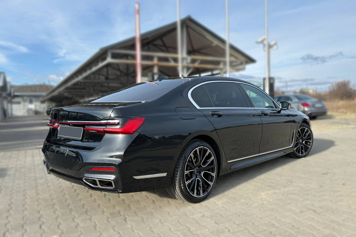 LCI tuning package compatible with BMW 7 Series G12 long wheelbase (2016-2018), with glossy black elements