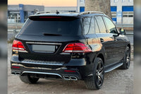 Pachet tuning tip 63 compatibil cu Mercedes ML W166 (2011-2015) convertit în GLE W166, compatibil cu modelul cu faruri xenon