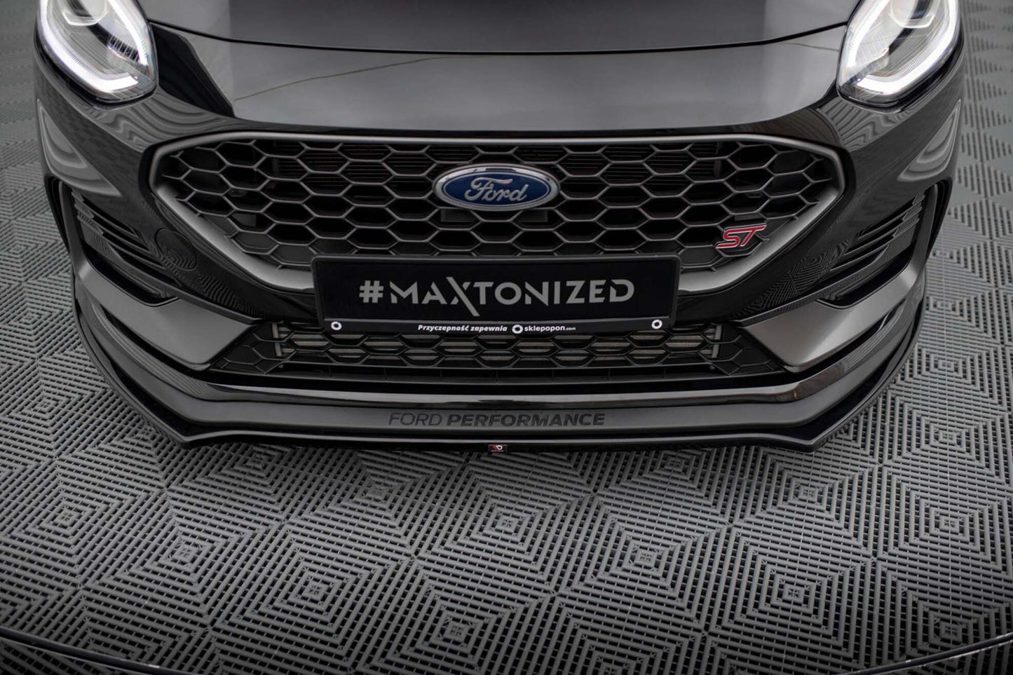 Spoiler Maxton Design versiunea 1 pentru bara faţă ST a Ford Fiesta (după 2021), negru lacuit