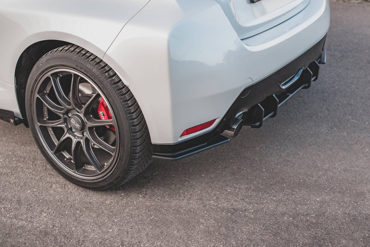 Extensii laterale tip Racing Maxton Design pentru bara spate GR a Toyota Yaris (dupa 2020), negru mat/lucios