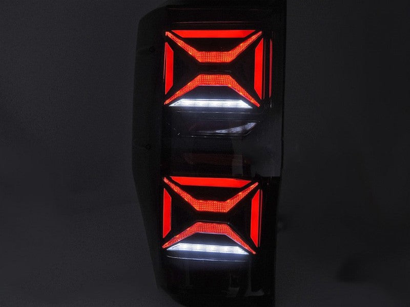 Set stopuri tuning LED pentru Ford Ranger (2011-2018), cu semnalizator dinamic, baza negru-fum, stanga si dreapta