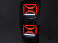 Set stopuri tuning LED pentru Ford Ranger (2011-2018), cu semnalizator dinamic, baza negru-fum, stanga si dreapta