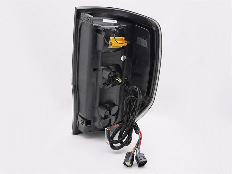 Set stopuri tuning LED pentru Ford Ranger (2011-2018), cu semnalizator dinamic, baza negru-fum, stanga si dreapta