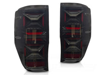 Set stopuri tuning LED pentru Ford Ranger (2011-2018), cu semnalizator dinamic, baza negru-fum, stanga si dreapta