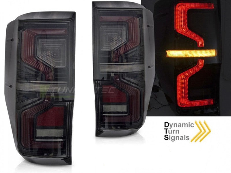 Set stopuri tuning LED pentru Ford Ranger (2011-2018), cu semnalizator dinamic, baza negru-fum, stanga si dreapta
