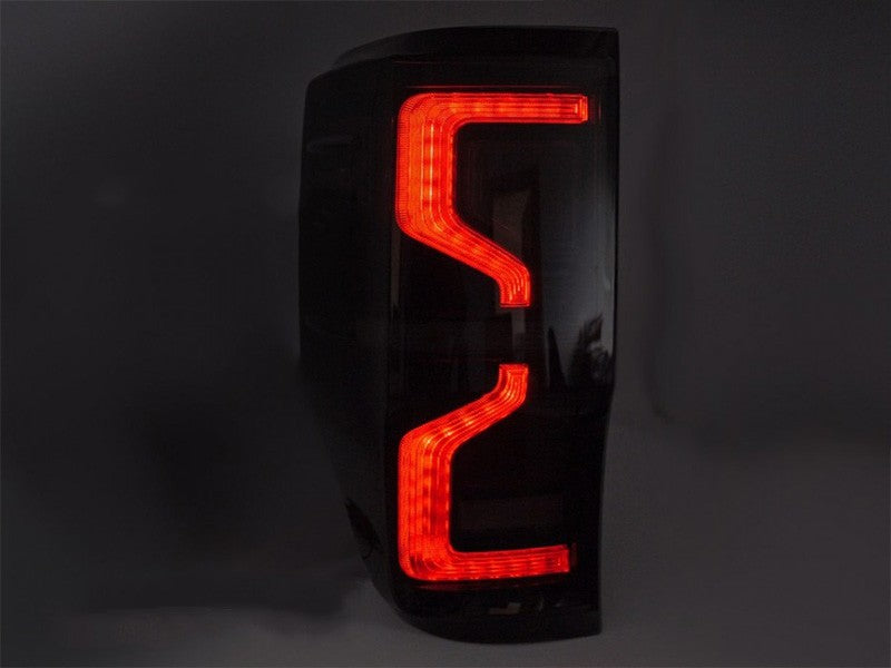 Set stopuri tuning LED pentru Ford Ranger (2011-2018), cu semnalizator dinamic, baza negru-fum, stanga si dreapta