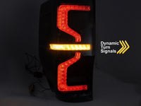 Set stopuri tuning LED pentru Ford Ranger (2011-2018), cu semnalizator dinamic, baza negru-fum, stanga si dreapta