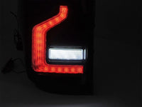 Set stopuri tuning LED pentru Ford Ranger (2011-2018), cu semnalizator dinamic, baza negru-fum, stanga si dreapta
