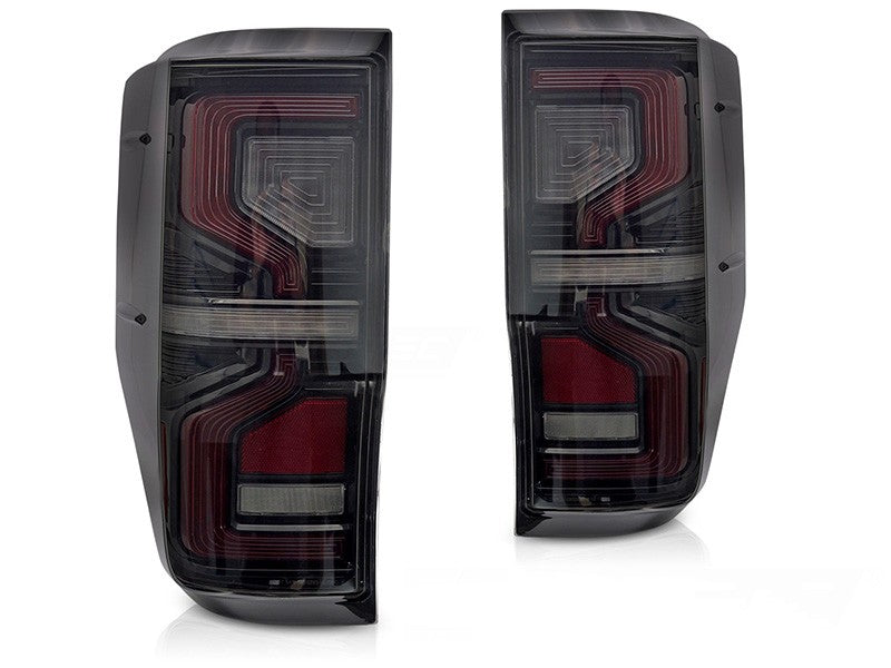 Set stopuri tuning LED pentru Ford Ranger (2011-2018), cu semnalizator dinamic, baza negru-fum, stanga si dreapta