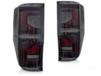 Set stopuri tuning LED pentru Ford Ranger (2011-2018), cu semnalizator dinamic, baza negru-fum, stanga si dreapta
